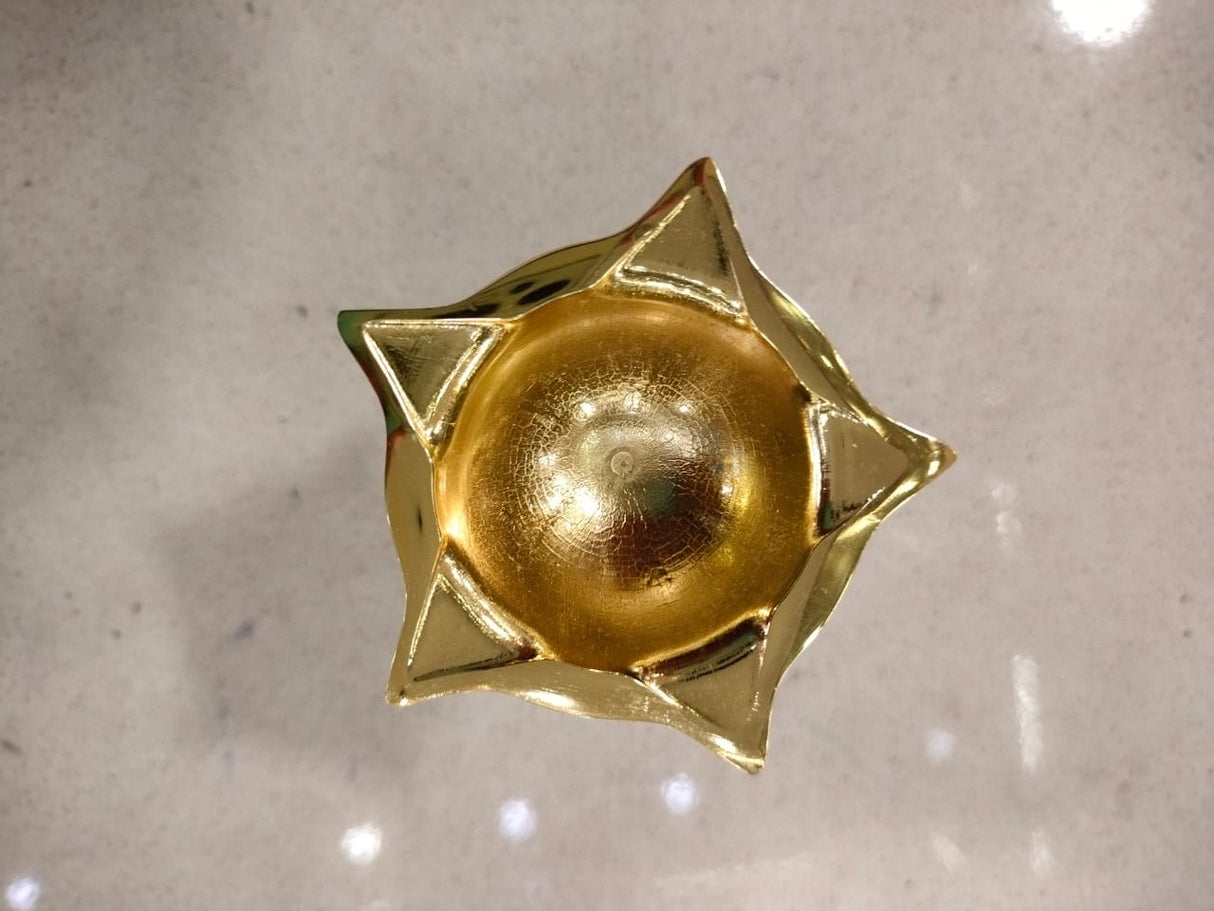 Golden Brass Star-Shaped Diya with Decorative Base