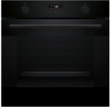 Black oven with digital display on a black background