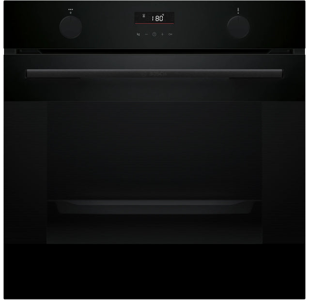 Black oven with digital display on a black background