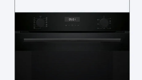 Black oven with digital display on a white background