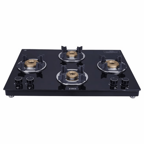 A slim black 4 burner gas stove with a toughened glass top and brass burners.