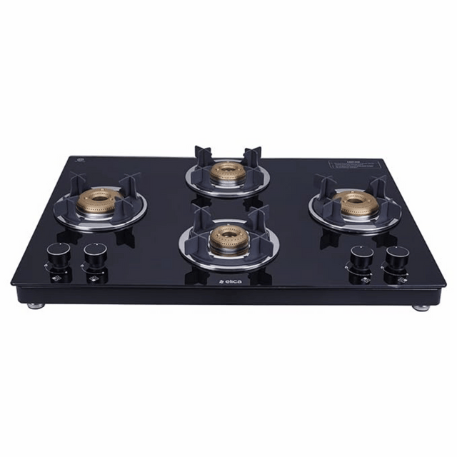 A slim black 4 burner gas stove with a toughened glass top and brass burners.