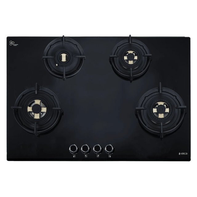 Black gas stove with four burners on a white background